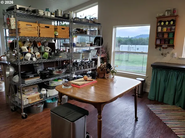 a room with wooden shelves and wooden floor