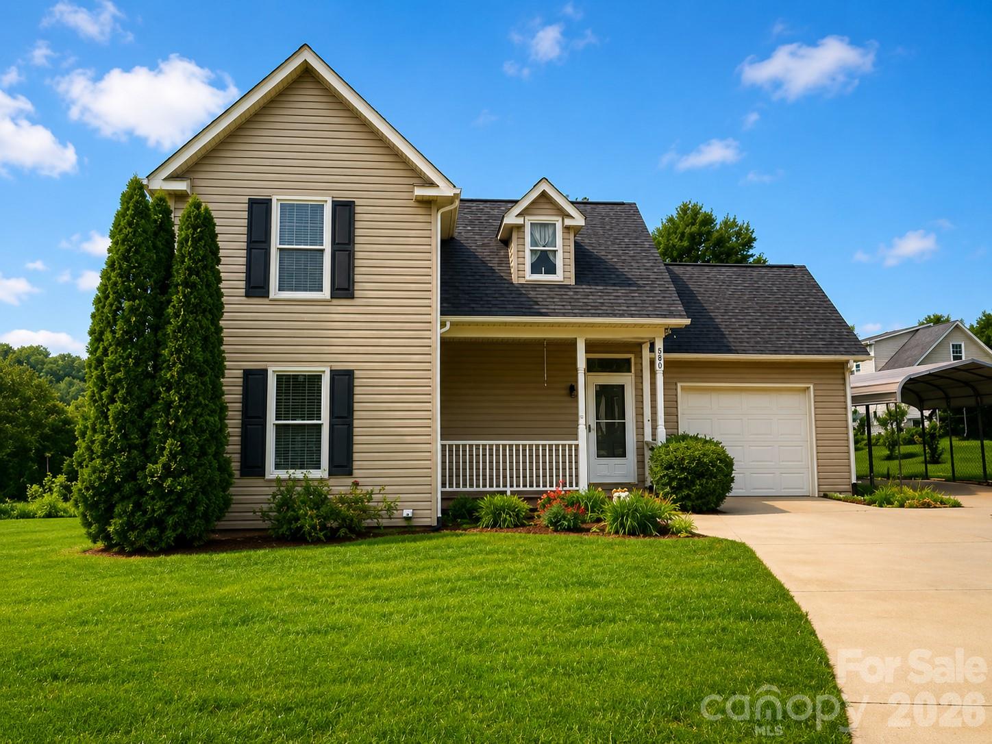 506 Pleasant Street Spindale, NC 28160 - Photo 2 of 42 a front view of a house with a yard