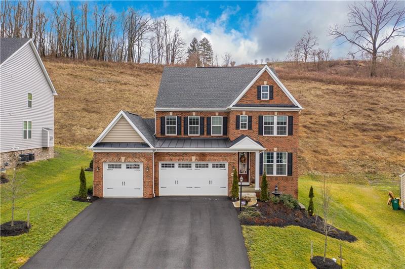 Front of the home, 3-car garage and covered entry. 