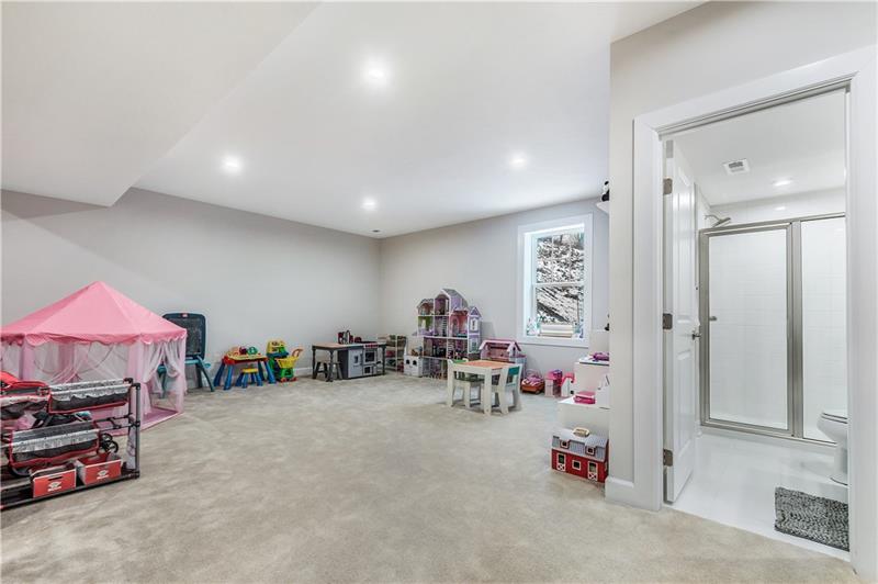 4423 Walnut Ridge Circle McDonald, PA 15057 - Photo 23 of 25 Finished Basement. Tall ceilings and window.