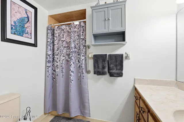 a view of a kitchen with washer and dryer