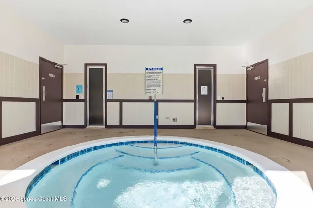 a view of a livingroom with a staircase