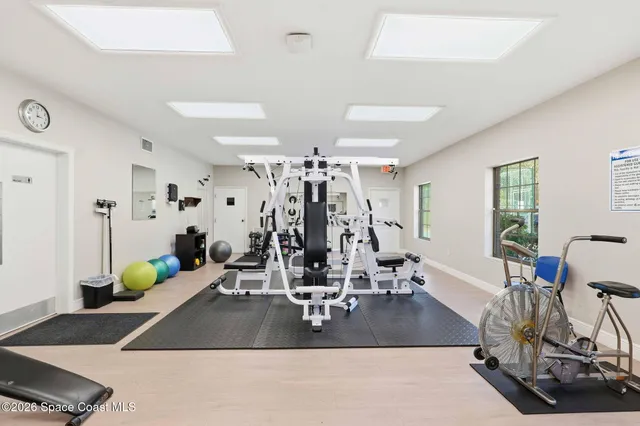a view of a room with gym equipment