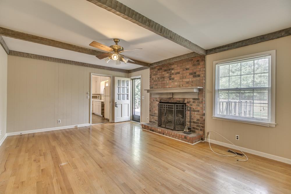 1111 Whitehall Road Murfreesboro, TN 37130 - Photo 17 of 26 Den w/hardwood, wood burning fireplace and wood beams