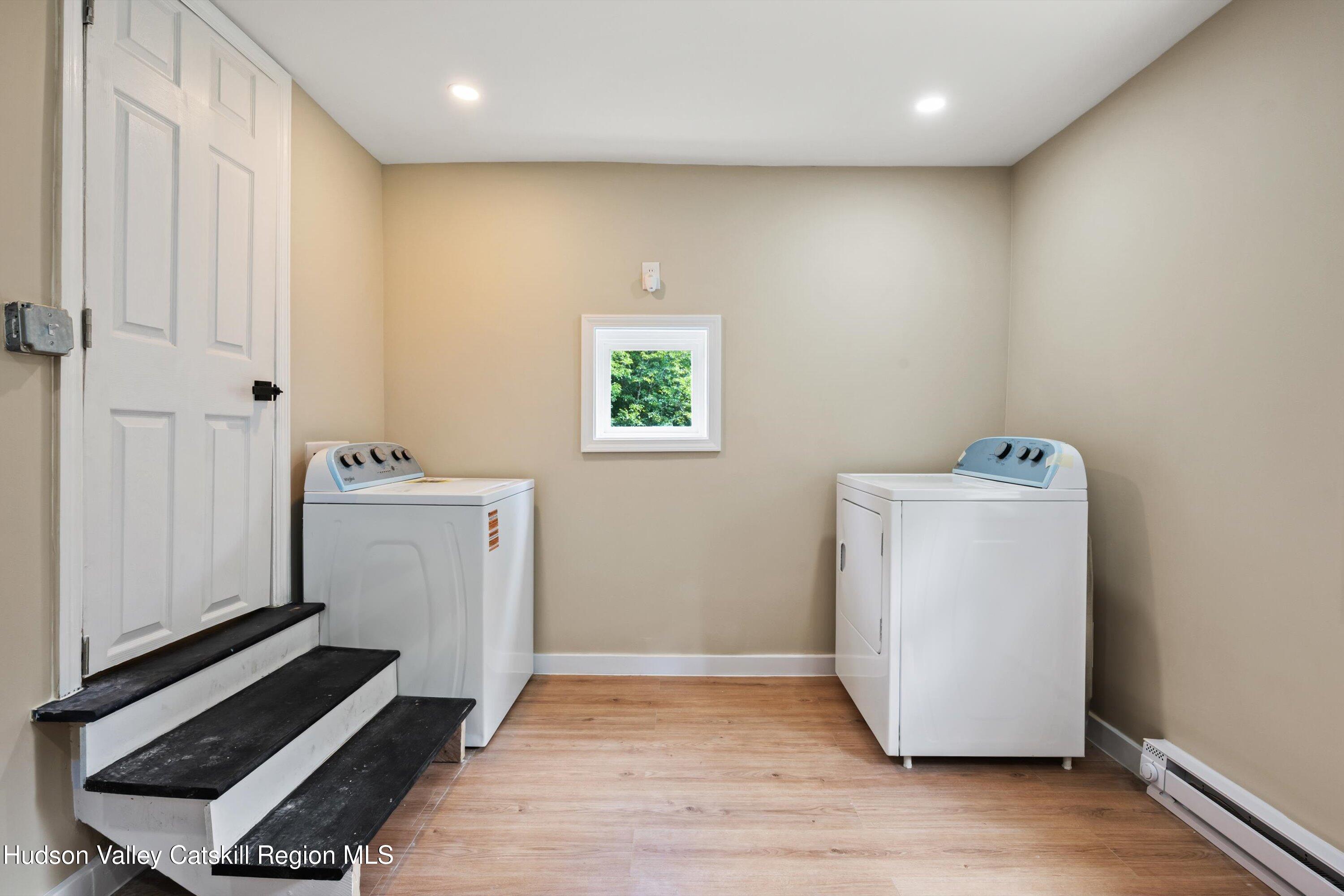 1320 Rudolph Weir Jr Road Earlton, NY 12058 - Photo 12 of 26 a utility room with a window dryer and washer