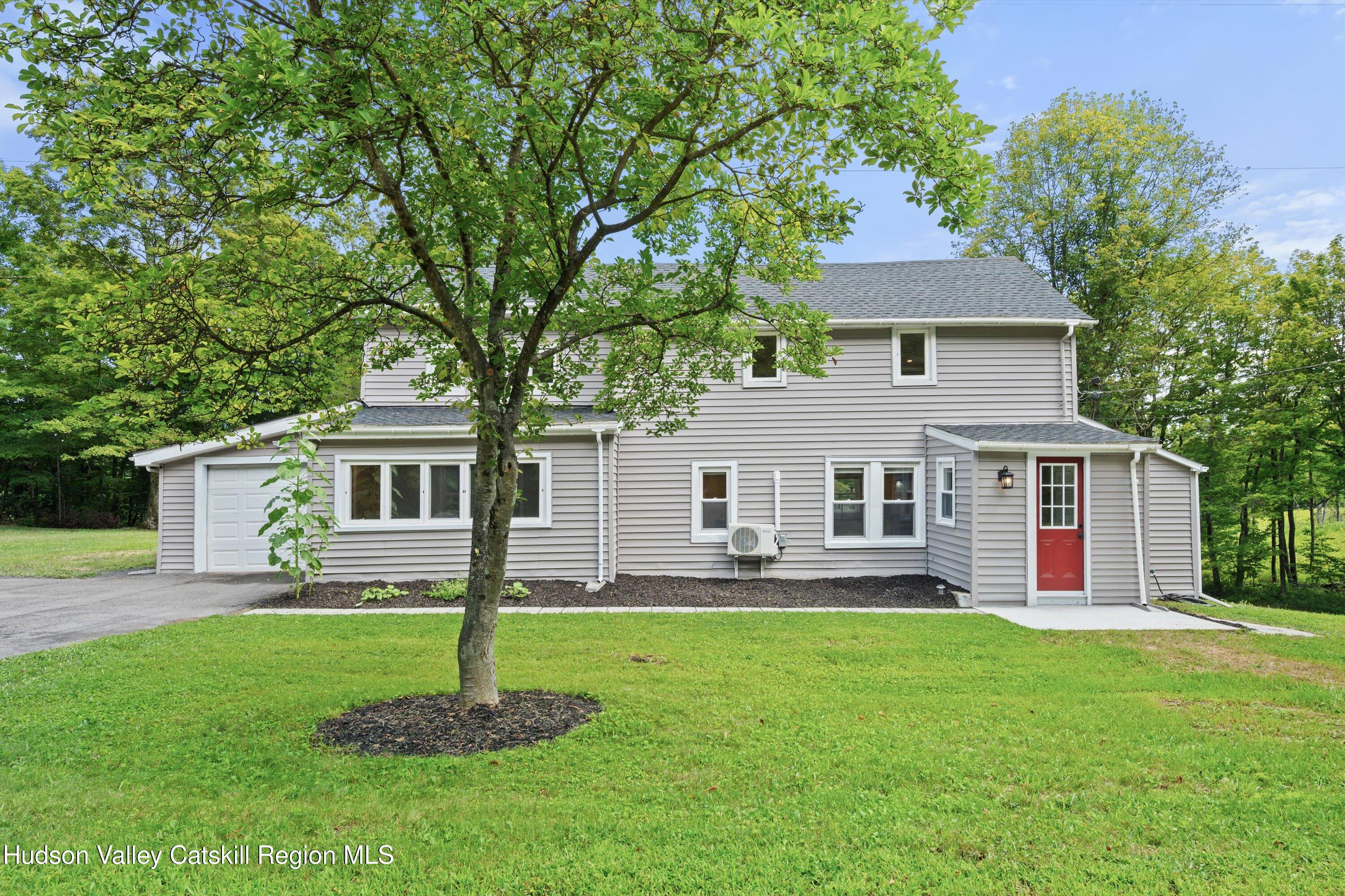 1320 Rudolph Weir Jr Road Earlton, NY 12058 - Photo 18 of 26 a front view of house with yard and green space