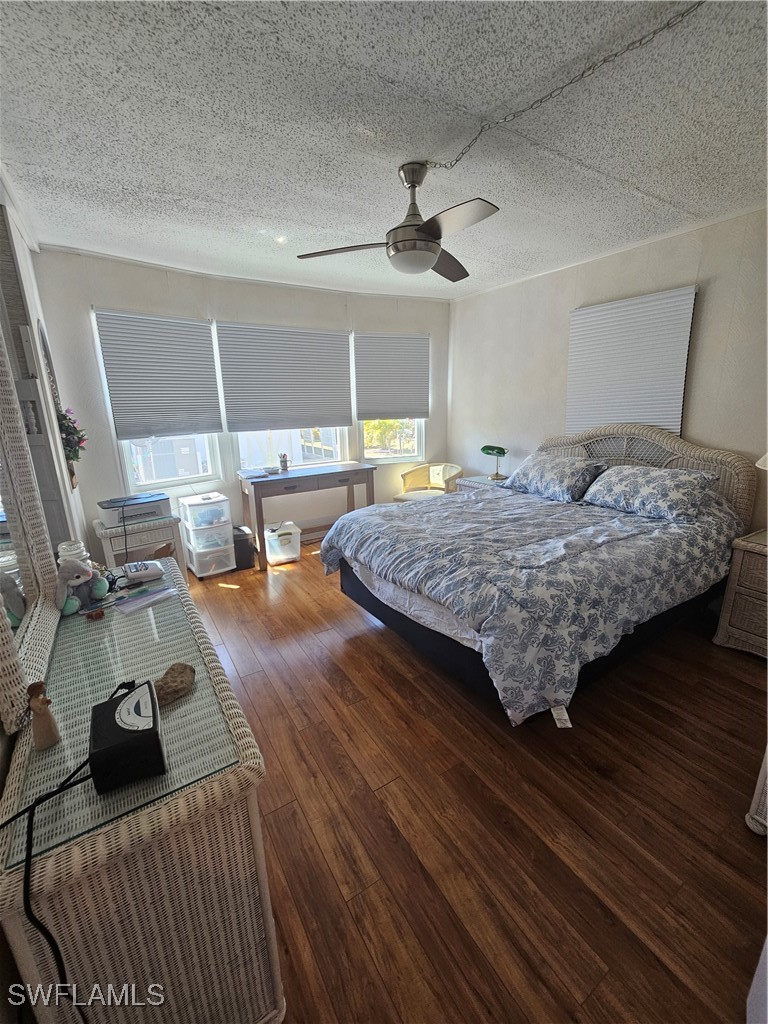 4 Elder Alva, FL 33920 - Photo 13 of 31 a bed sitting in a bedroom next to a window