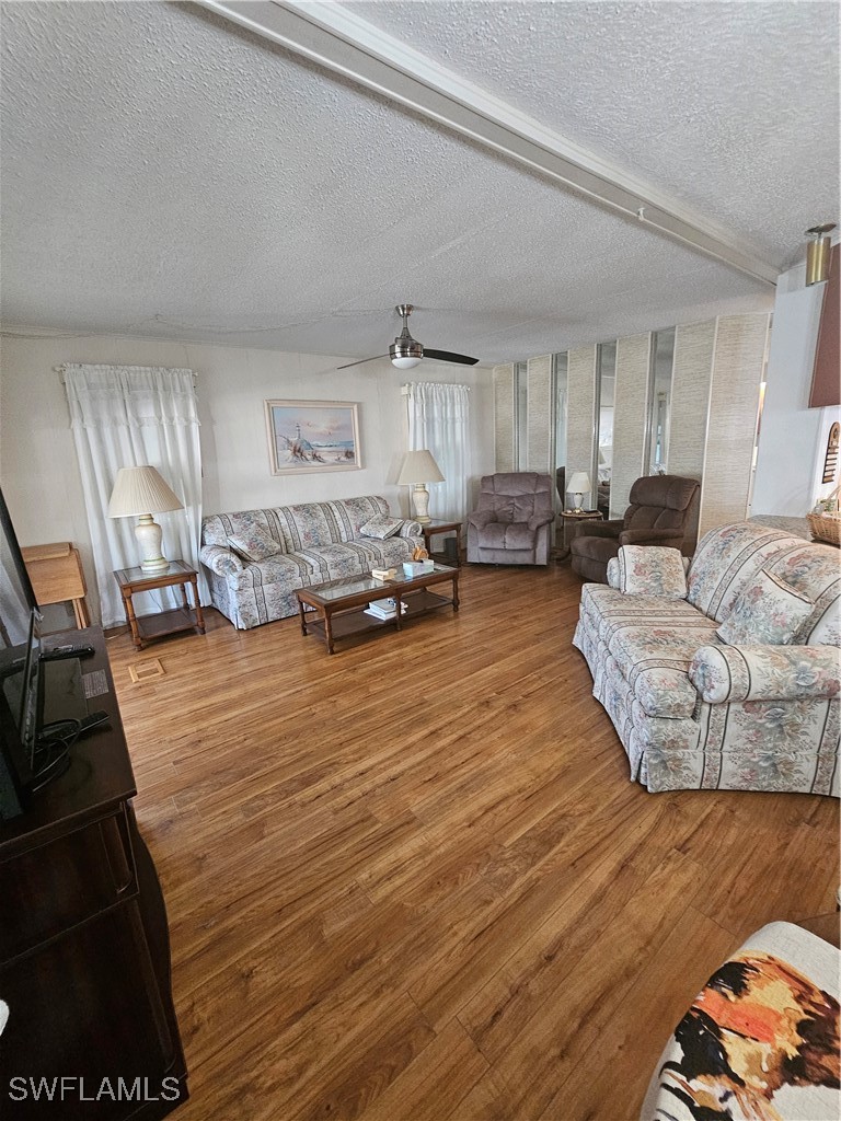 4 Elder Alva, FL 33920 - Photo 2 of 31 a living room with furniture and a wooden floor