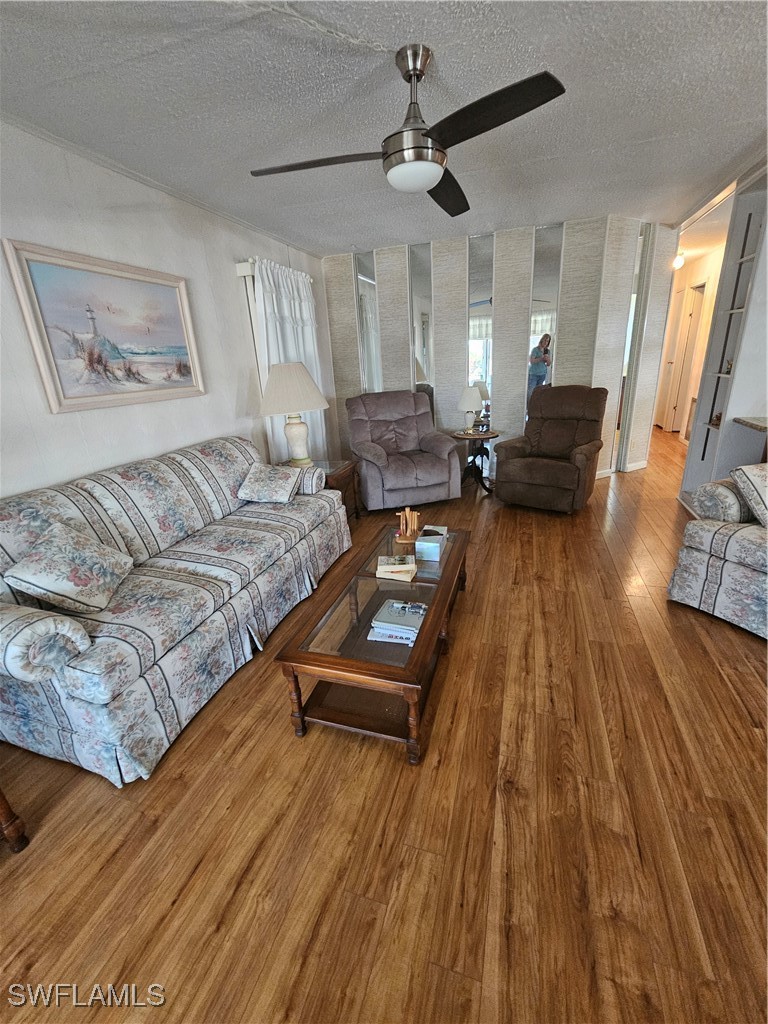 4 Elder Alva, FL 33920 - Photo 3 of 31 a living room with furniture and a wooden floor