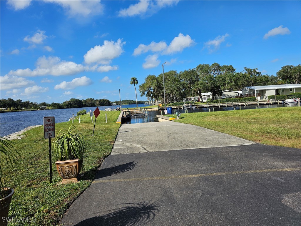 4 Elder Alva, FL 33920 - Photo 31 of 31 a view of a swimming pool and lounge chairs