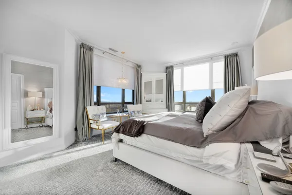 a living room with a couch and a window