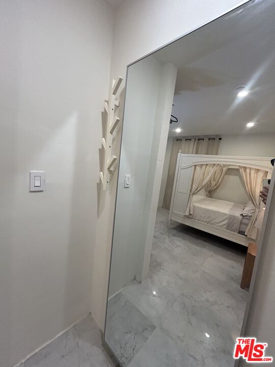 643 North Vista Street Los Angeles, CA 90036 - Photo 12 of 51 a bathroom with a shower and a sink