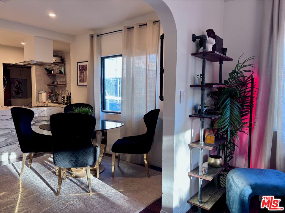 643 North Vista Street Los Angeles, CA 90036 - Photo 2 of 51 a living room with furniture and a window