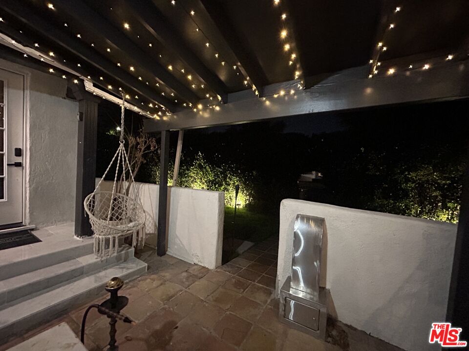 643 North Vista Street Los Angeles, CA 90036 - Photo 22 of 51 a view of a lobby with furniture and potted plants