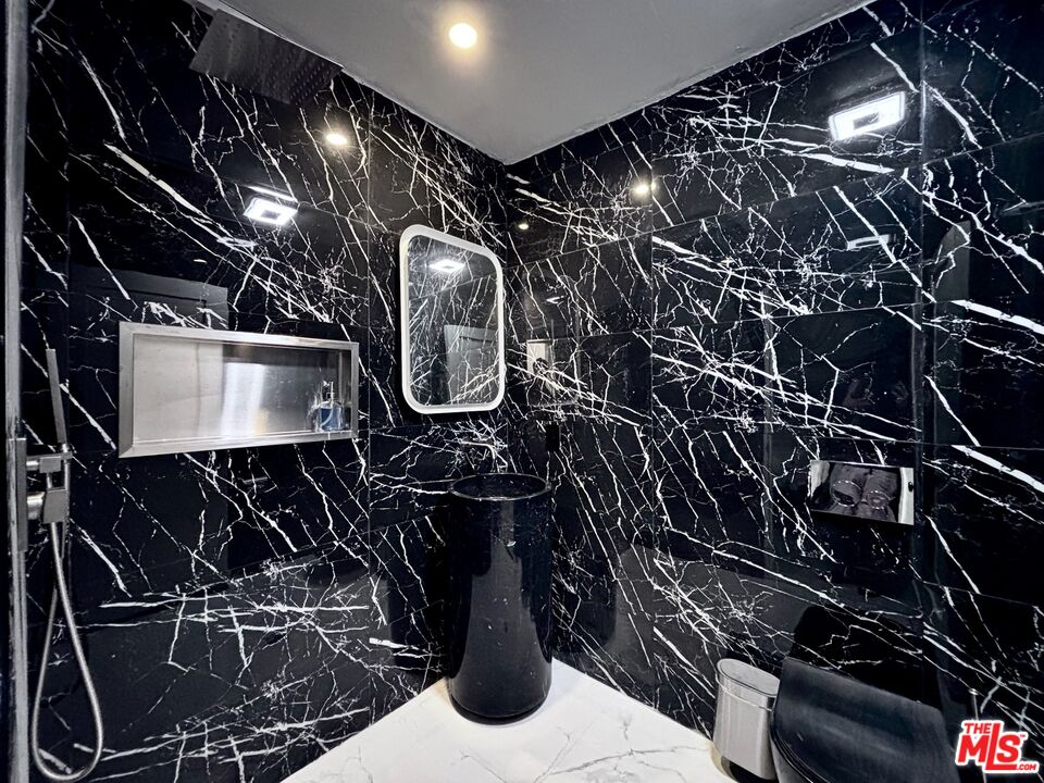 643 North Vista Street Los Angeles, CA 90036 - Photo 28 of 51 a close view of water heater