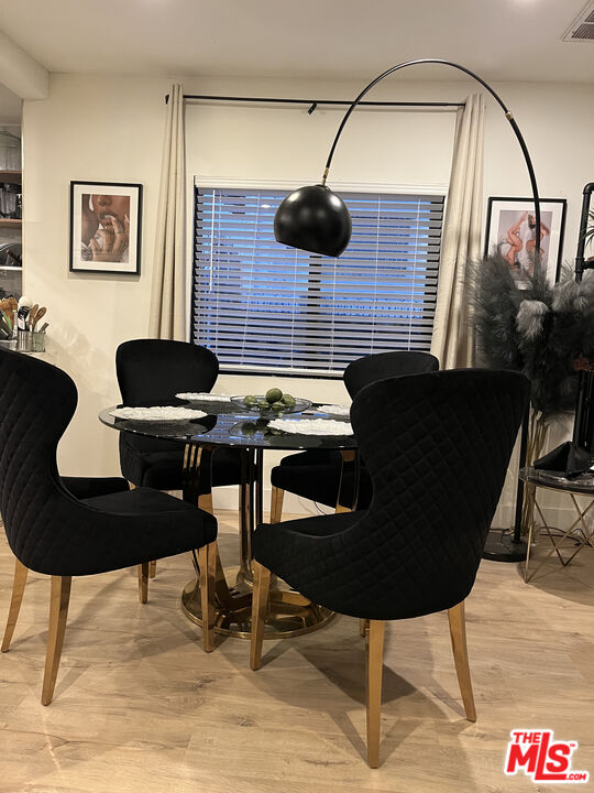 643 North Vista Street Los Angeles, CA 90036 - Photo 39 of 51 a living room with furniture and a potted plant