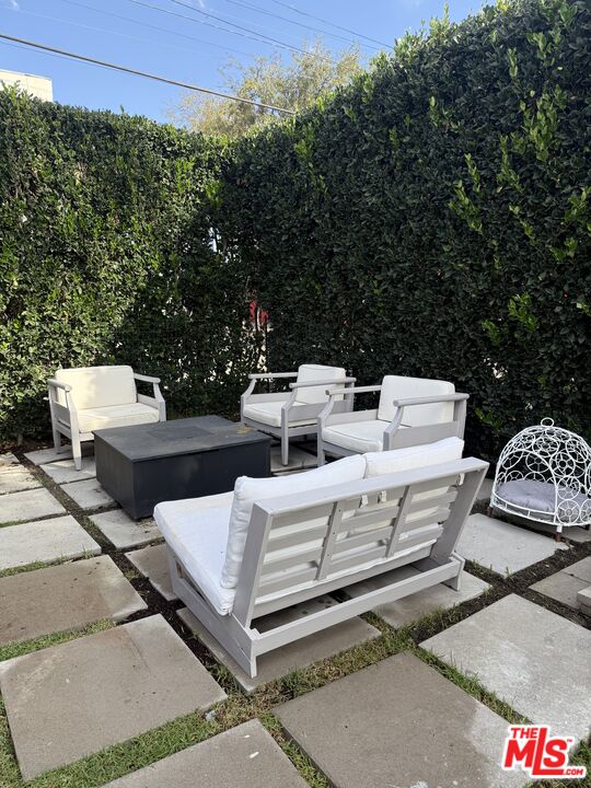 643 North Vista Street Los Angeles, CA 90036 - Photo 49 of 51 a view of a patio with white furniture