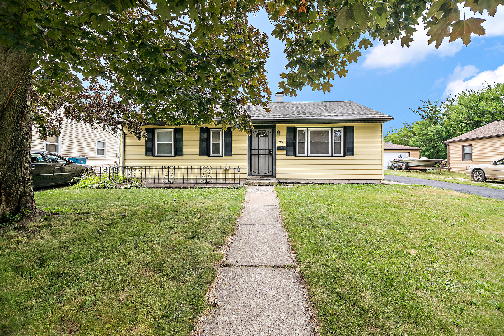 729 Webster Circle West Kankakee, IL 60901 - Photo 15 of 16 a front view of a house with yard