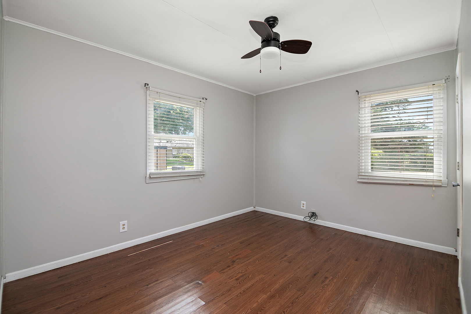 729 Webster Circle West Kankakee, IL 60901 - Photo 7 of 16 a view of a room with wooden floor and windows