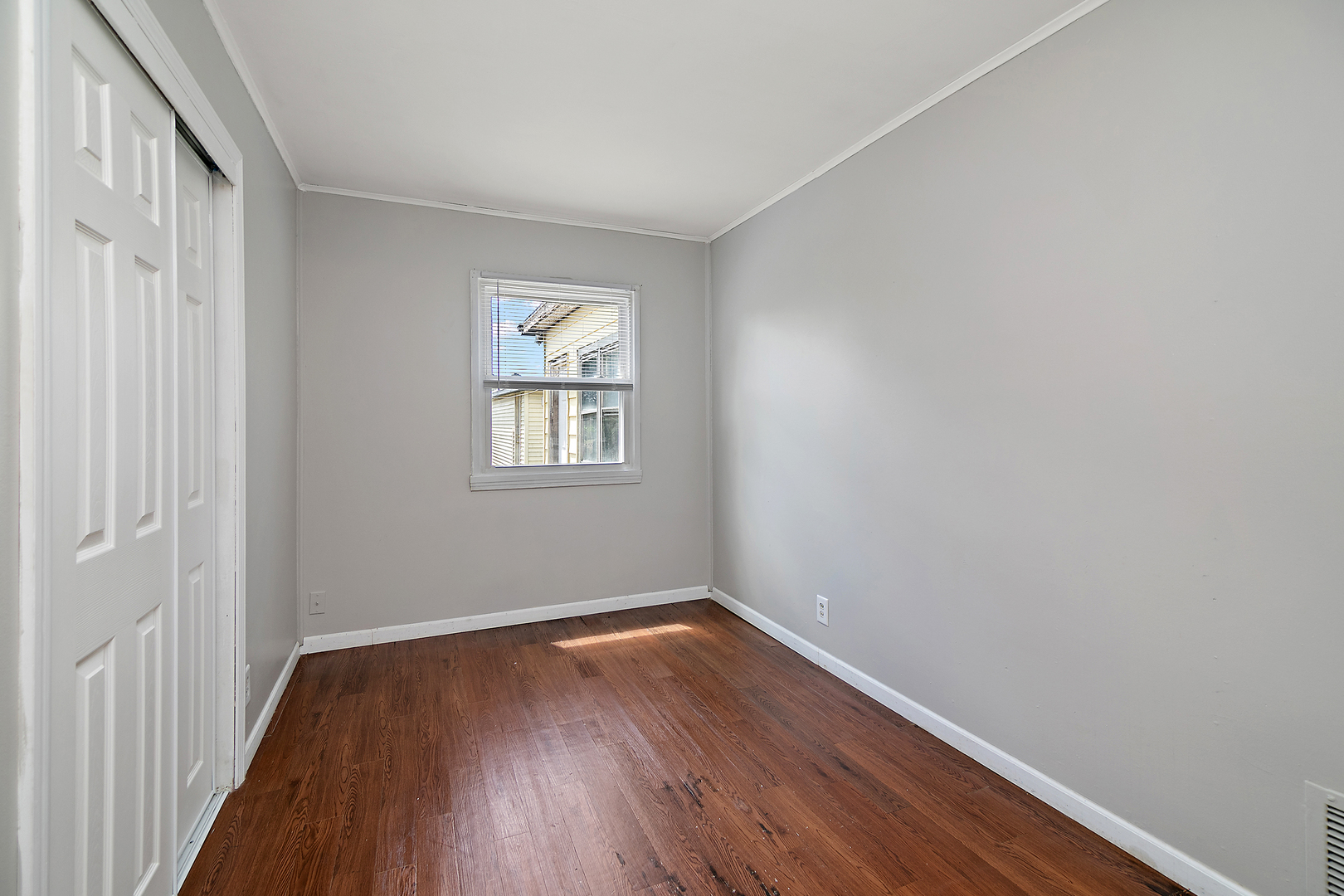 729 Webster Circle West Kankakee, IL 60901 - Photo 10 of 16 a view of a room with wooden floor and windows