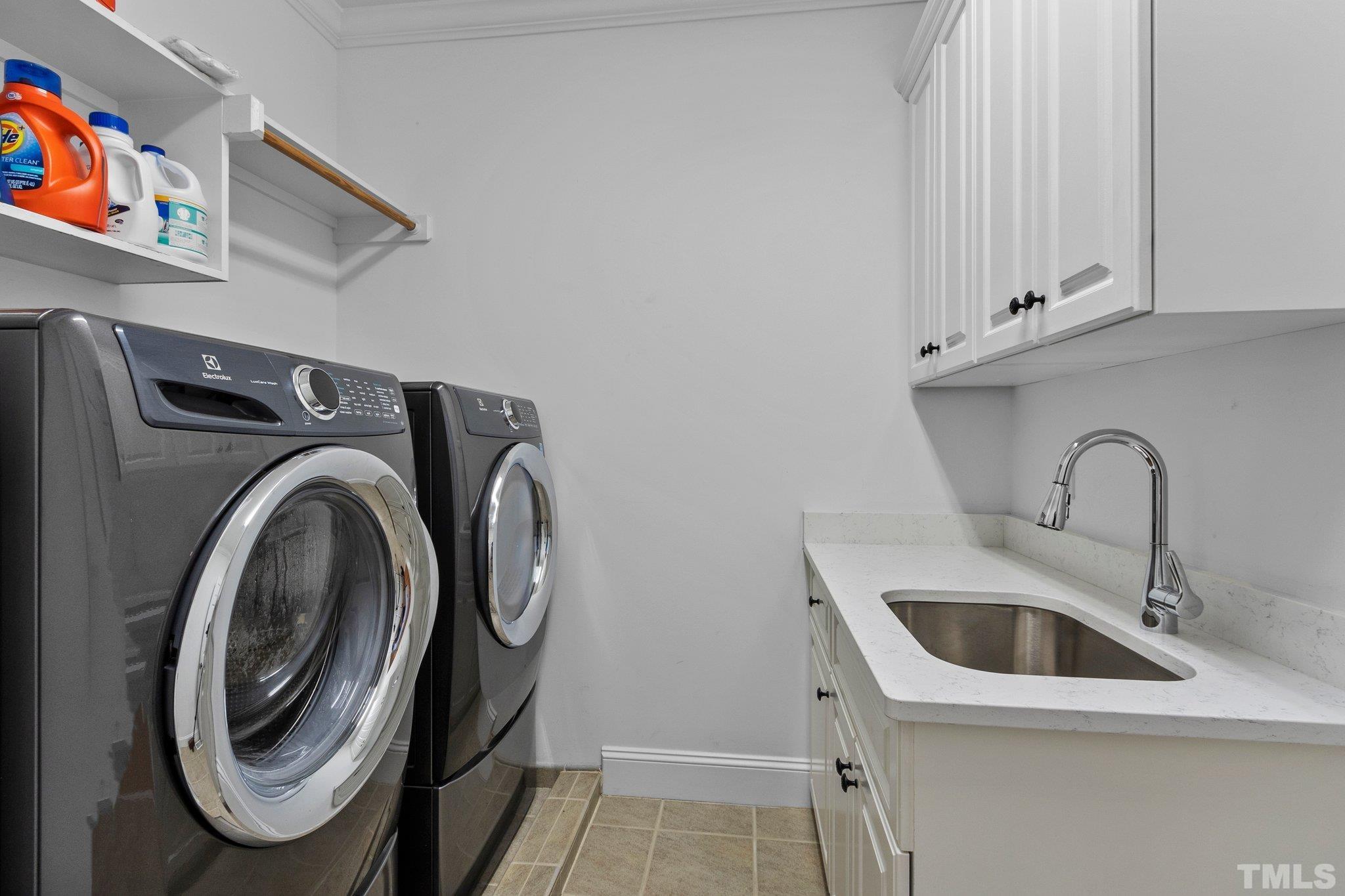 3205 Tall Tree Place Raleigh, NC 27607 - Photo 20 of 58 a utility room with dryer and washer