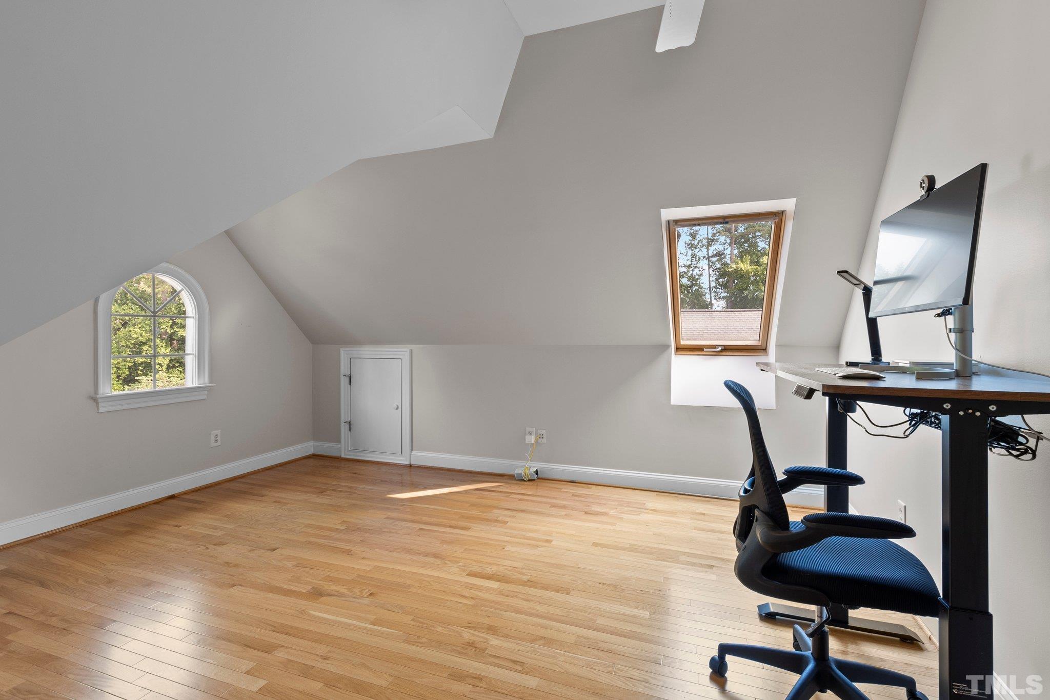 3205 Tall Tree Place Raleigh, NC 27607 - Photo 40 of 58 a workspace with furniture and window