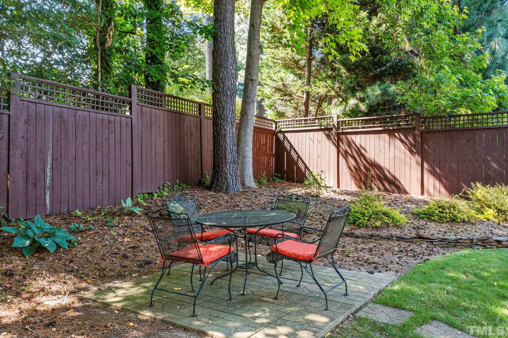 3205 Tall Tree Place Raleigh, NC 27607 - Photo 44 of 58 a view of house with backyard and sitting area