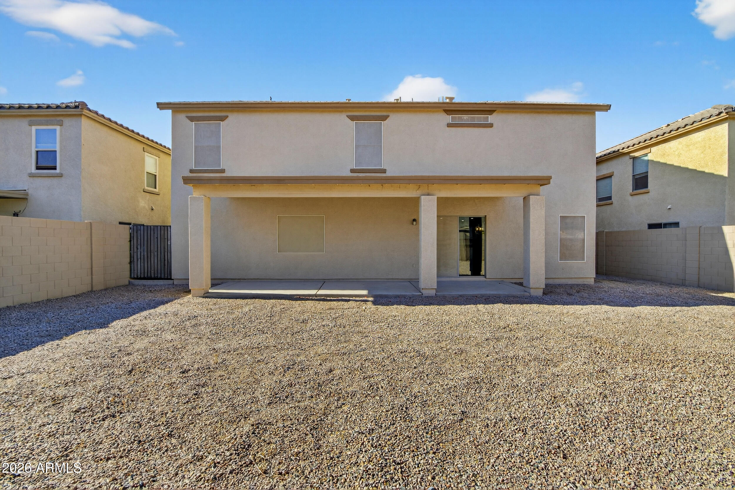 43620 West Cowpath Road Maricopa, AZ 85138 - Photo 57 of 60 front view of a house with a yard