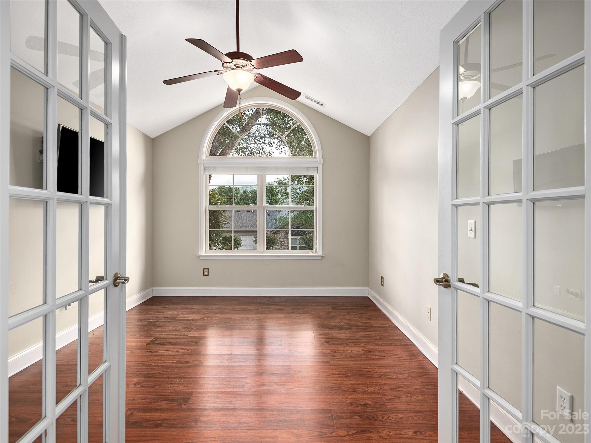 75 Outlook Circle Swannanoa, NC 28778 - Photo 12 of 31 wooden floor in an empty room with a window