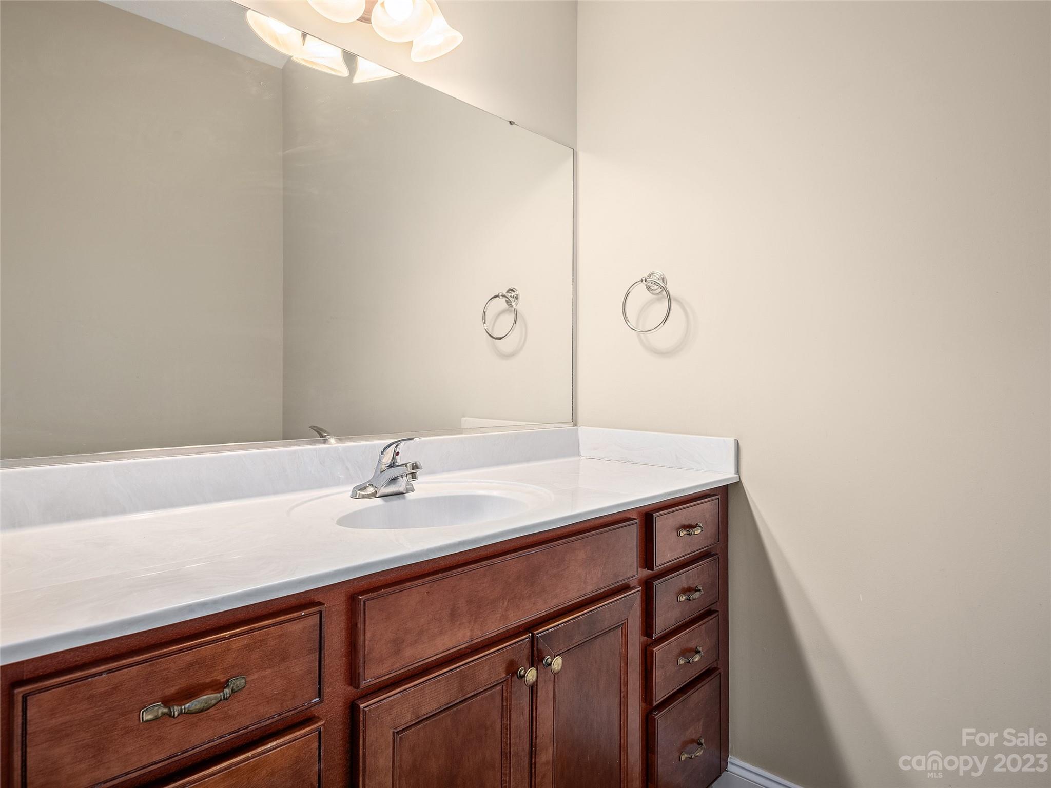 75 Outlook Circle Swannanoa, NC 28778 - Photo 17 of 31 a bathroom with a sink and a mirror