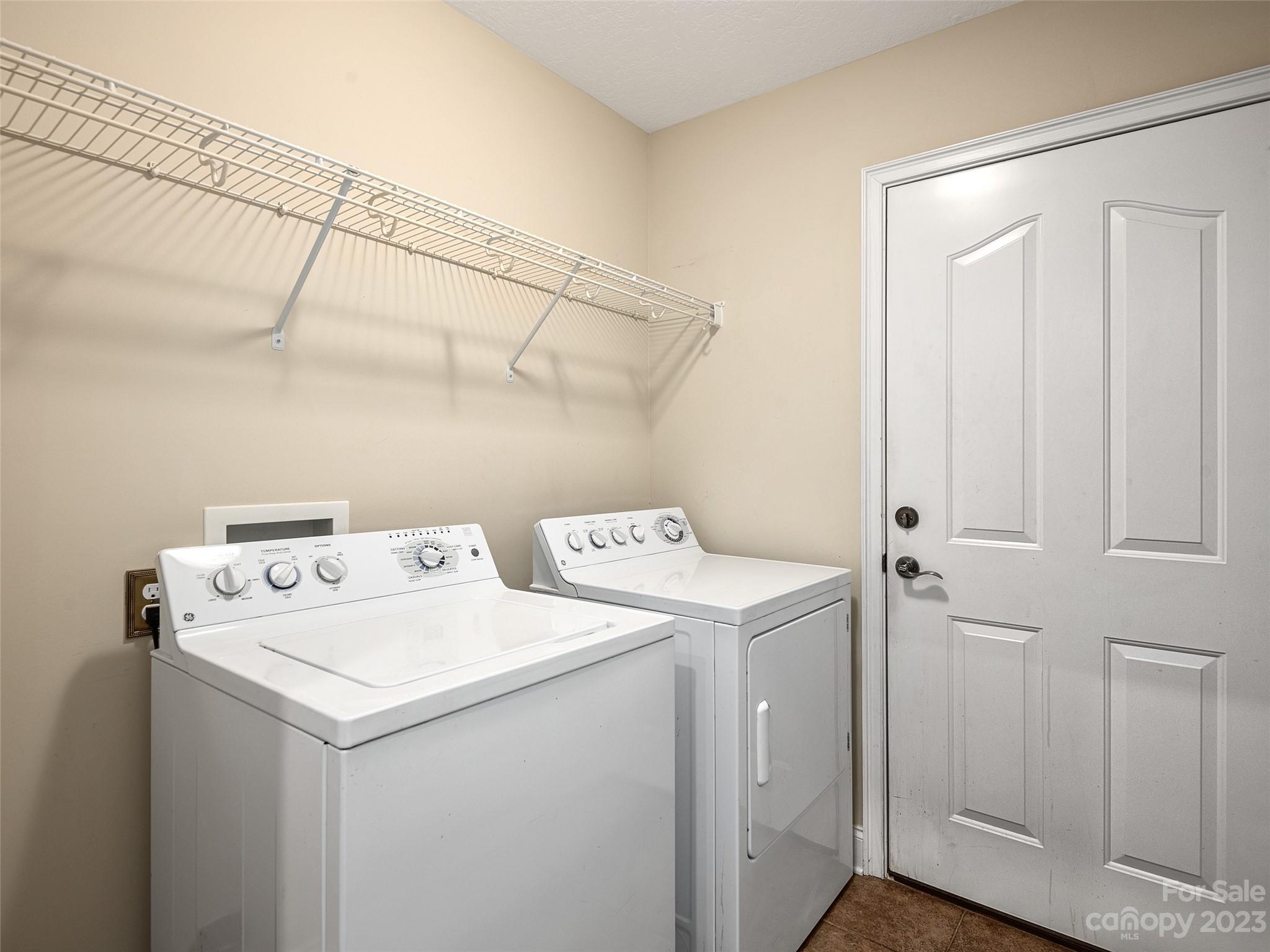 75 Outlook Circle Swannanoa, NC 28778 - Photo 18 of 31 a utility room with dryer and washer