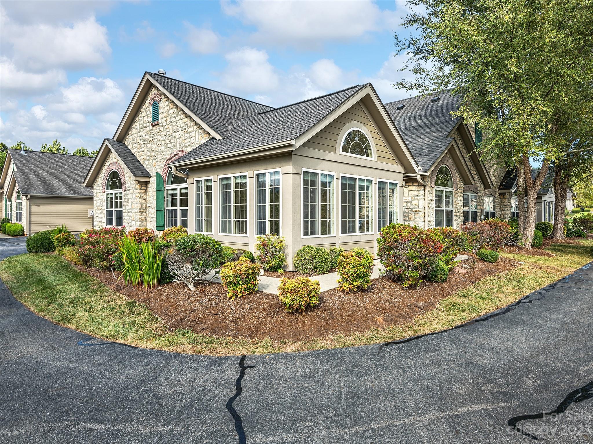 75 Outlook Circle Swannanoa, NC 28778 - Photo 19 of 31 a front view of a house with a yard