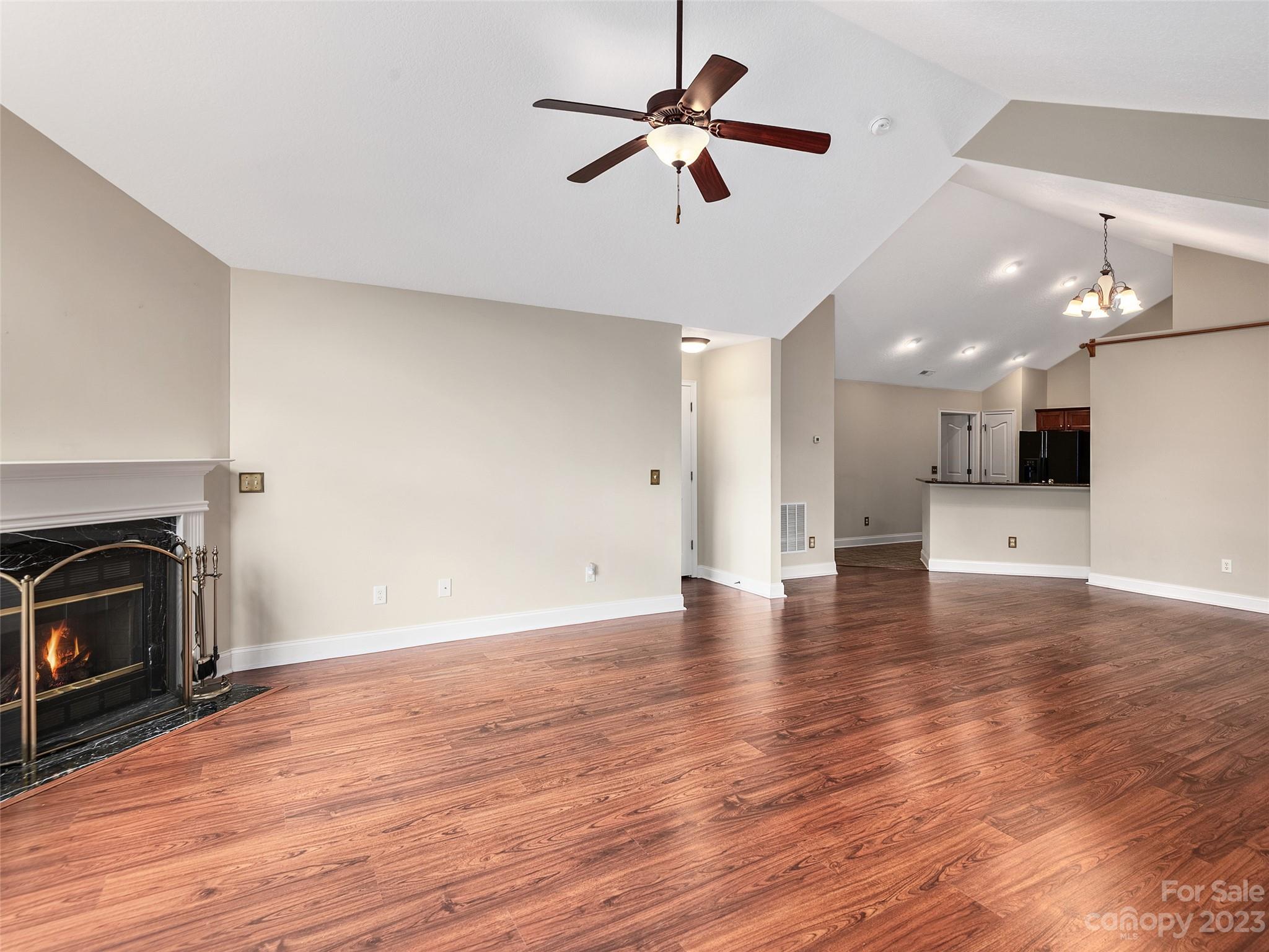 75 Outlook Circle Swannanoa, NC 28778 - Photo 5 of 31 a view of a kitchen with a stove cabinets and wooden floor