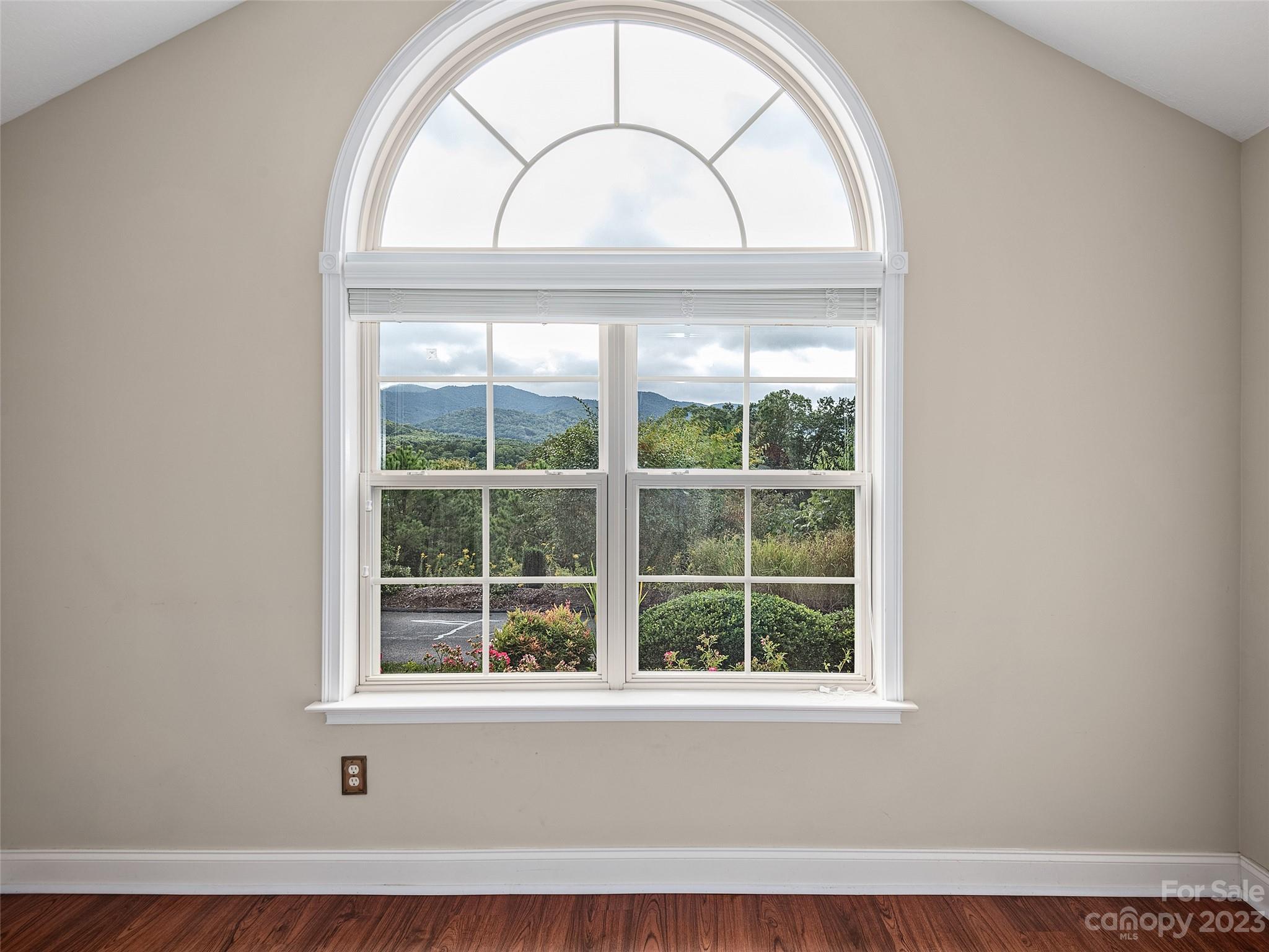 75 Outlook Circle Swannanoa, NC 28778 - Photo 9 of 31 a view of a livingroom with wooden floor and a large window