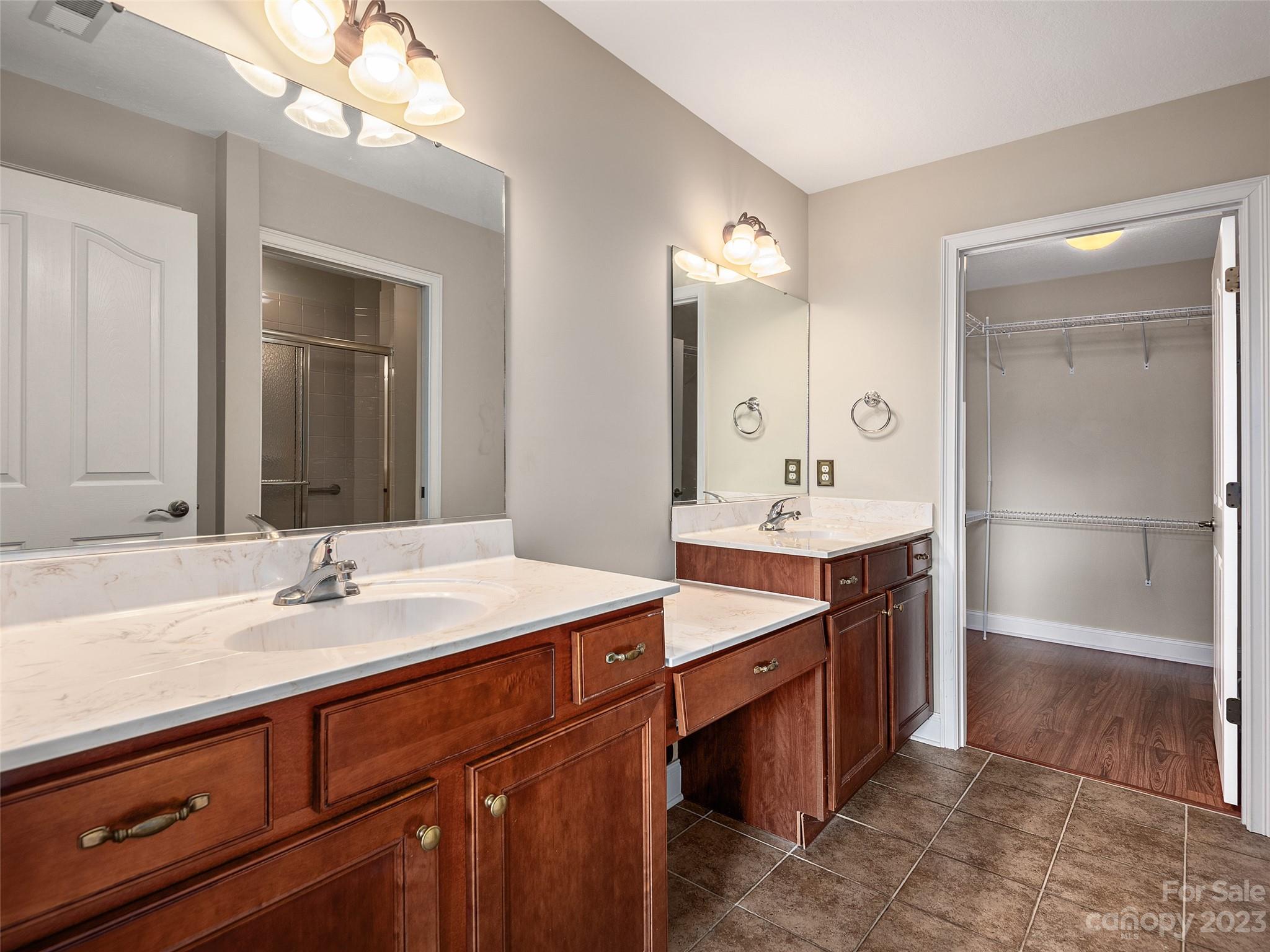 75 Outlook Circle Swannanoa, NC 28778 - Photo 10 of 31 a bathroom with a sink double vanity and a mirror