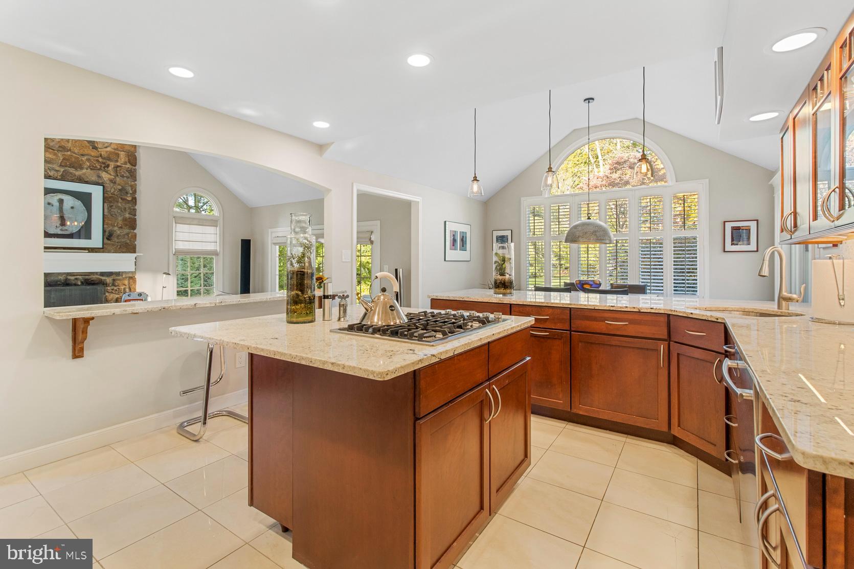 1449 Sugartown Road Berwyn, PA 19312 - Photo 15 of 59 Kitchen w/ breakfast bar overlooking family room