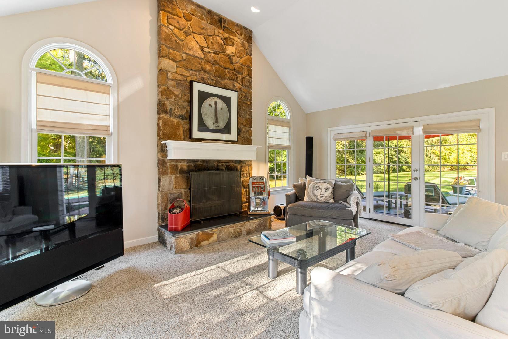 1449 Sugartown Road Berwyn, PA 19312 - Photo 20 of 59 Family room w/ doors to outside patio and pool