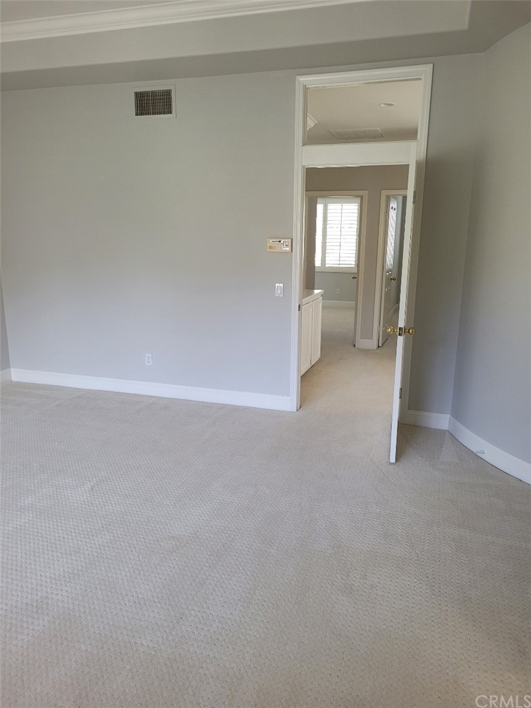 2 Belfort Newport Coast, CA 92657 - Photo 13 of 18 a view of a big room with closet and mirror
