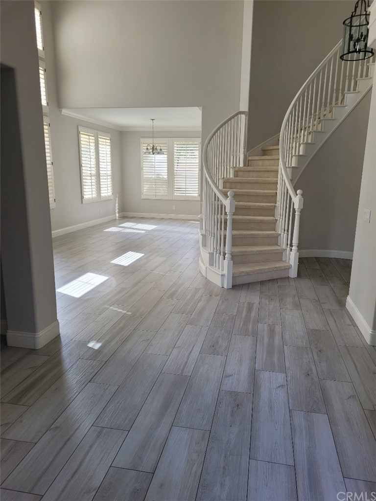 2 Belfort Newport Coast, CA 92657 - Photo 2 of 18 wooden floor in an empty room with a window
