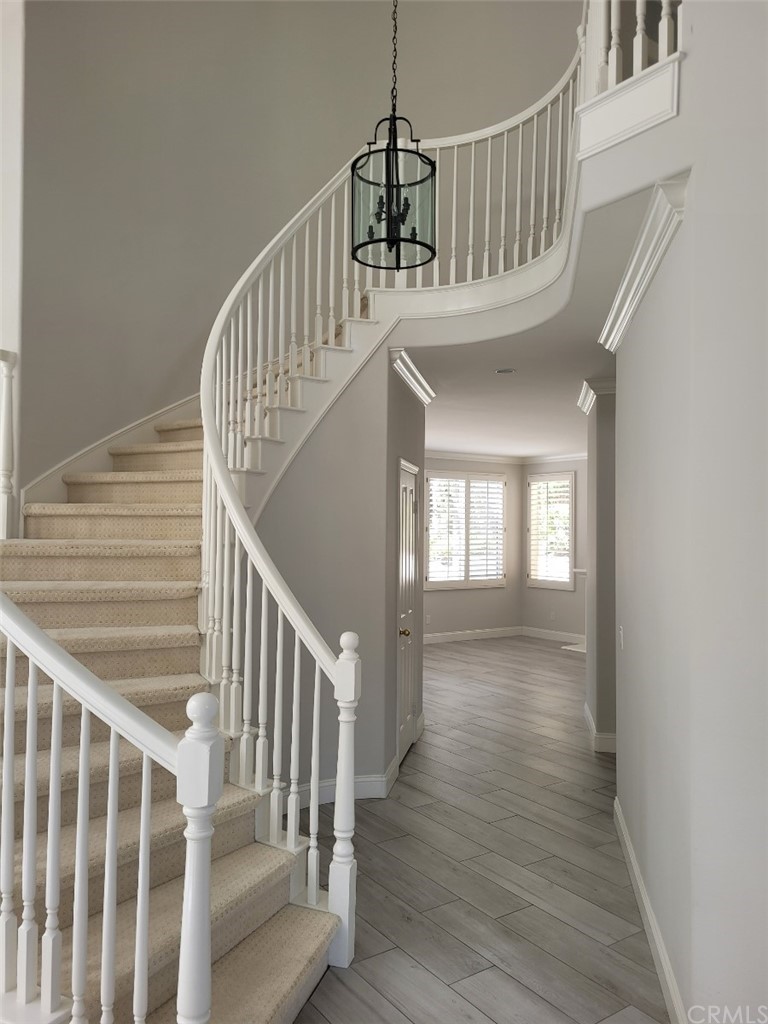 2 Belfort Newport Coast, CA 92657 - Photo 7 of 18 a view of entryway and hall with wooden floor