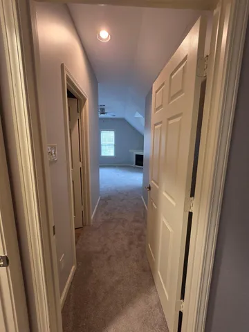 a view of hallway with window