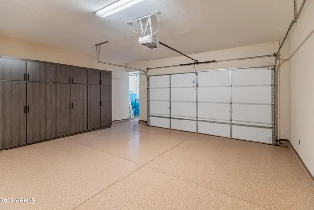 a view of a house with backyard porch and sitting area