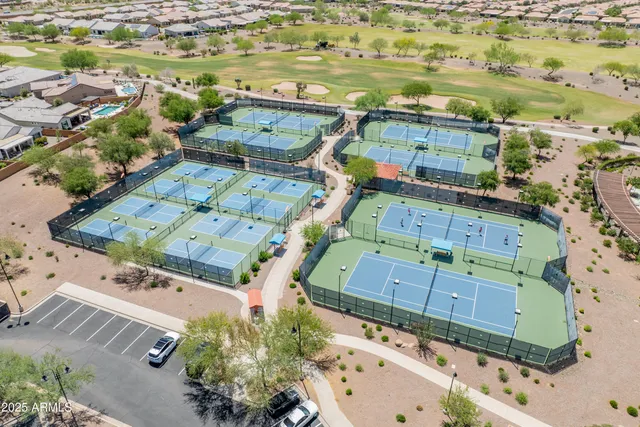 an aerial view of a house with a ocean view