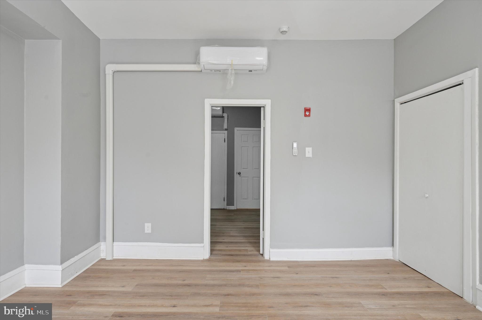 249 South 44th Street, Unit 4 Philadelphia, PA 19104 - Photo 21 of 25 a view of an empty room with wooden floor