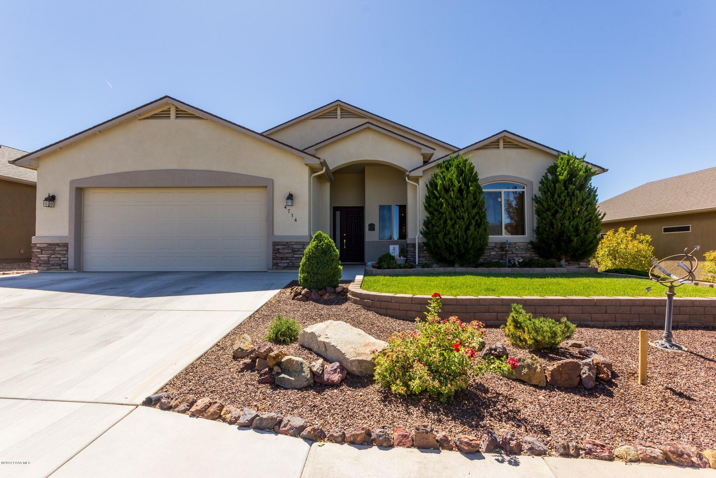 4714 Edgemont Road Prescott Valley, AZ 86314 - Photo 1 of 30 front view of a house with a yard