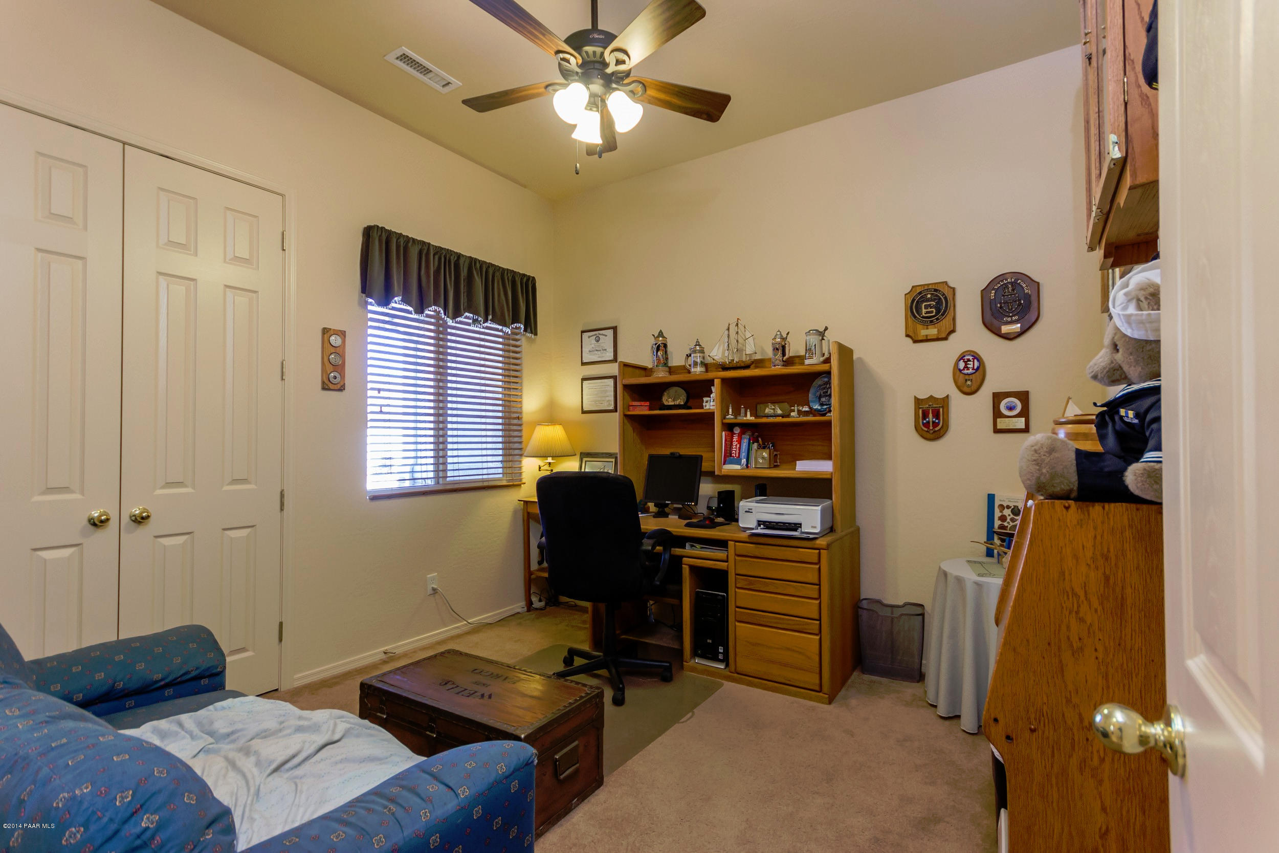 4714 Edgemont Road Prescott Valley, AZ 86314 - Photo 18 of 30 a bedroom with a workspace
