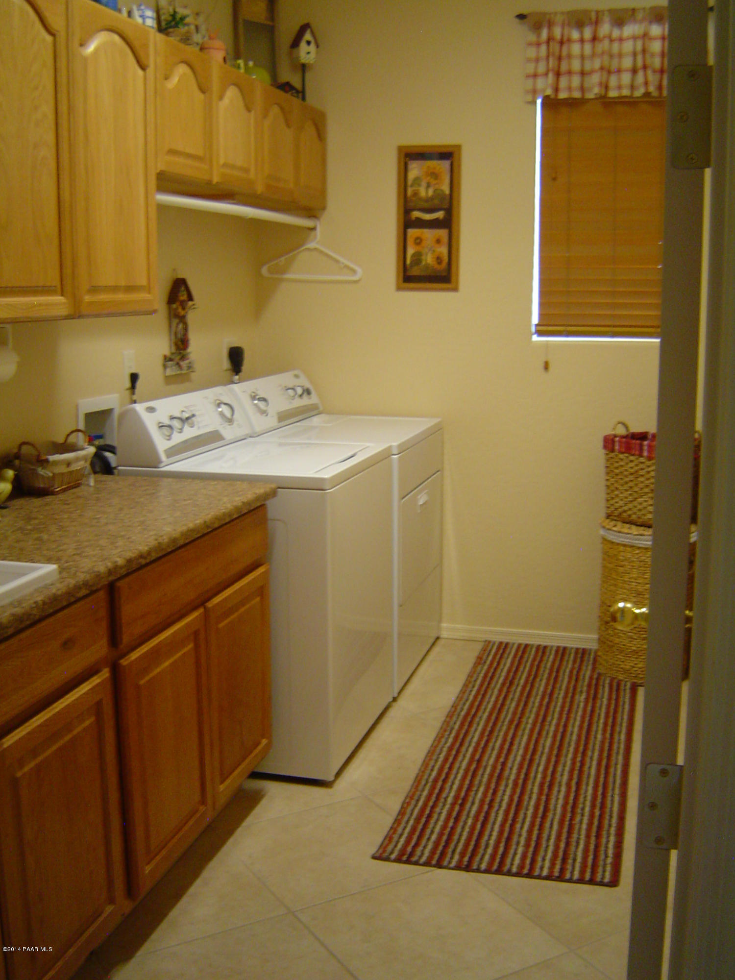 4714 Edgemont Road Prescott Valley, AZ 86314 - Photo 19 of 30 a bathroom with a sink and a mirror