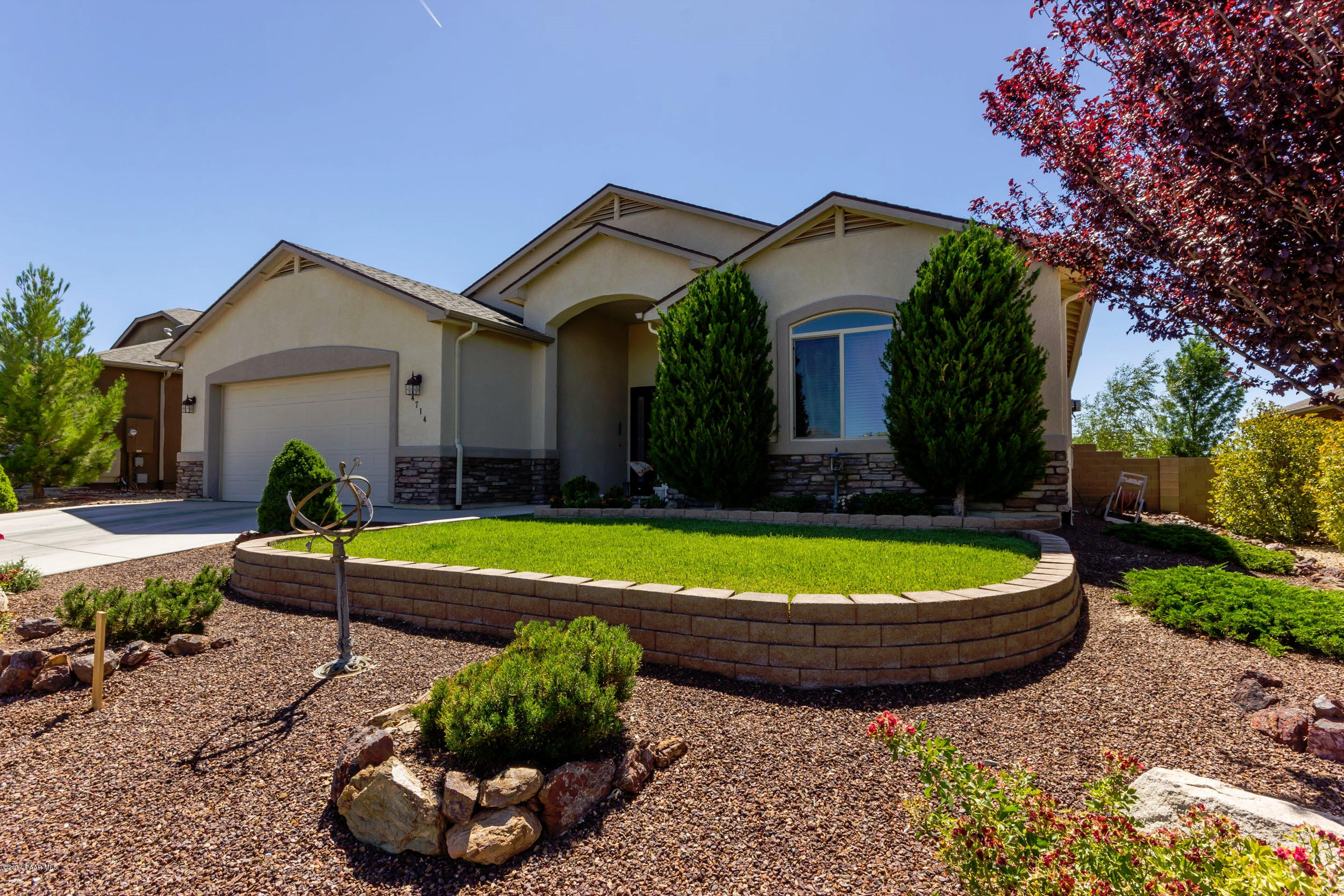 4714 Edgemont Road Prescott Valley, AZ 86314 - Photo 2 of 30 a view of a house with a swimming pool and a yard