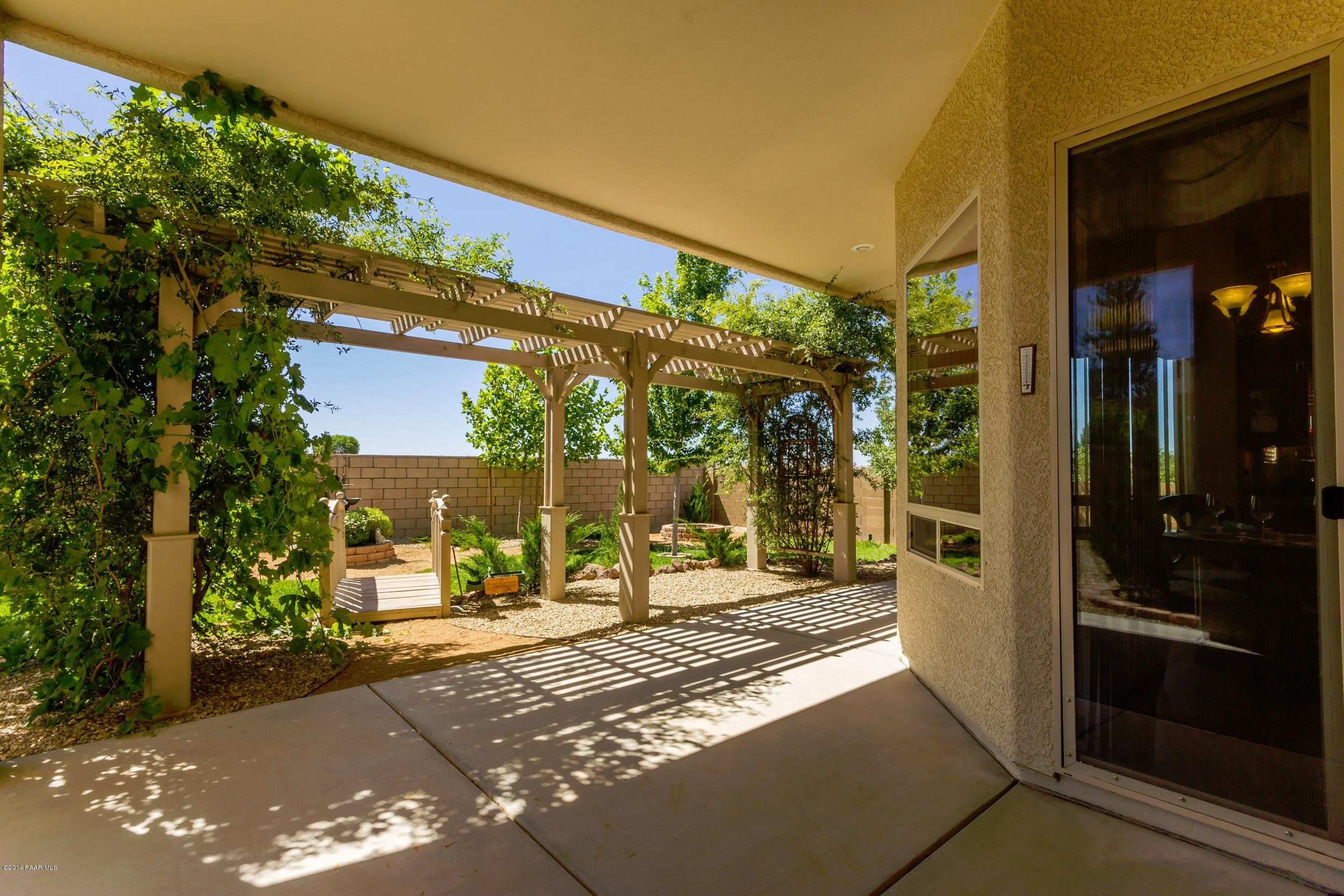 4714 Edgemont Road Prescott Valley, AZ 86314 - Photo 22 of 30 a view of a building with a patio