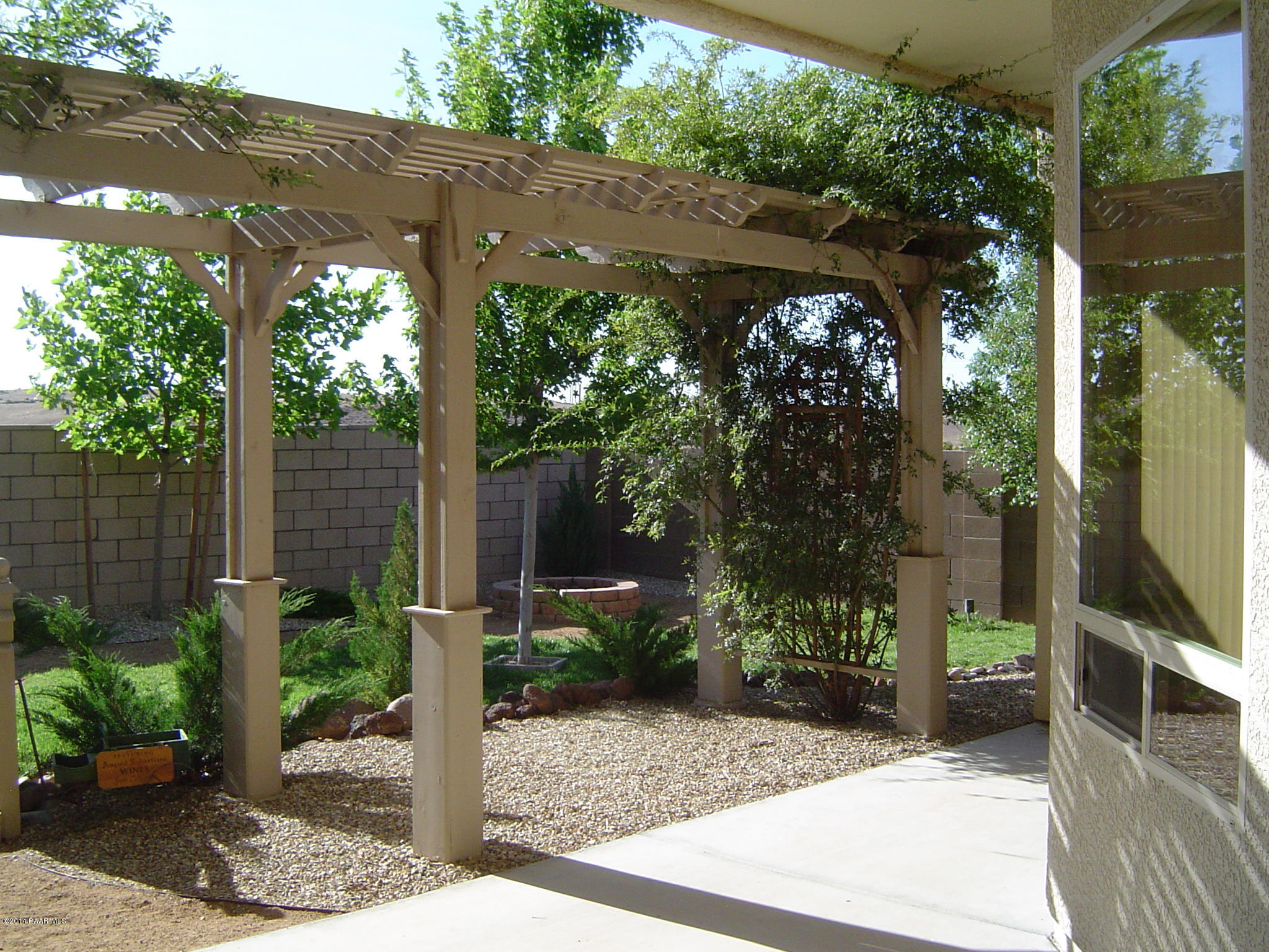 4714 Edgemont Road Prescott Valley, AZ 86314 - Photo 24 of 30 a front view of a house with a tree